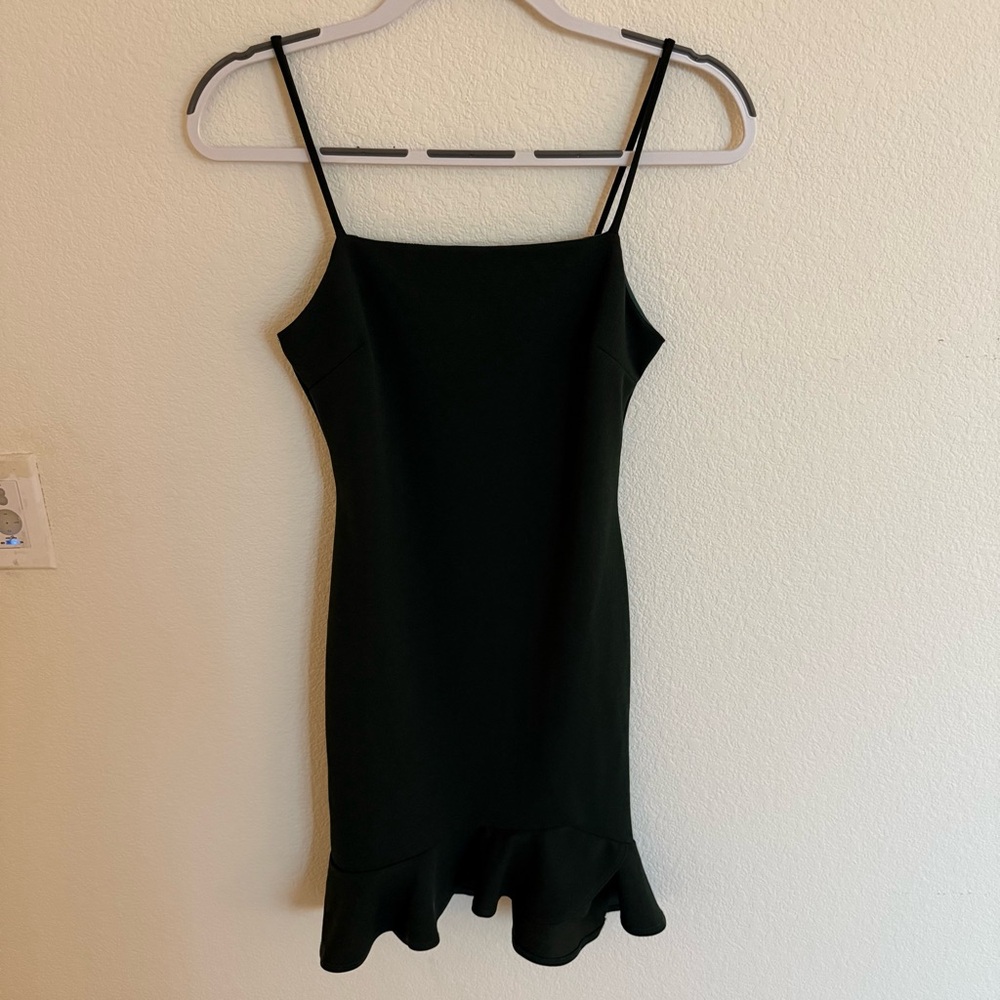 Dark green mini bodycon dress ruffle bottom